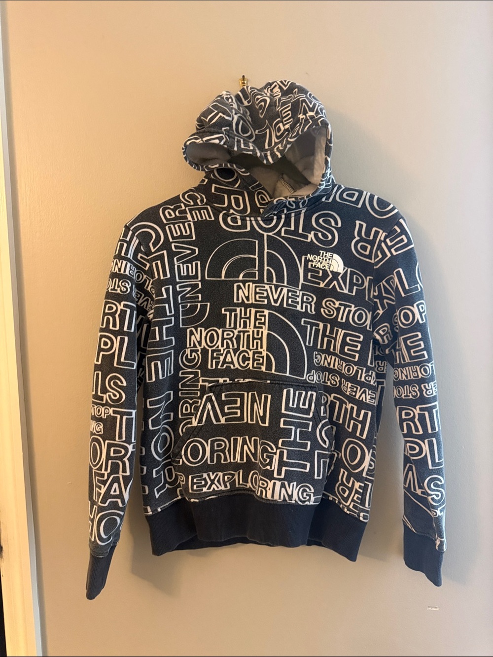 The North Face Kid’s Black and White All-Over Logo Crewneck Hoodie